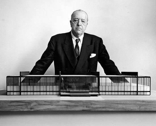 Mies standing behind a model of Crown Hall (Courtesy Illinois Institute of Technology)