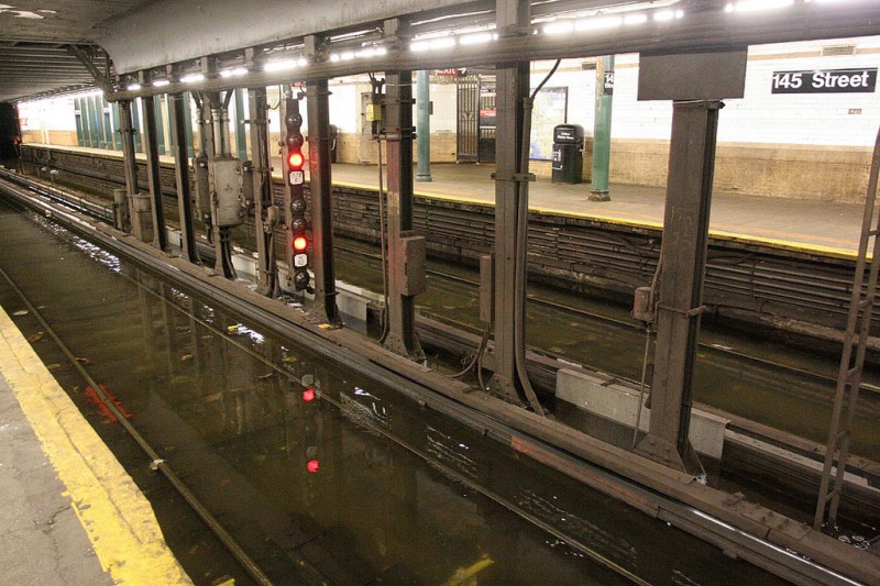 Water covers the tracks at 145th Street/Lenox Ave. station (Courtesy MTA / Leonard Wiggins)