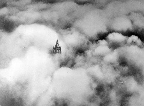 The Woolworth Building's crown through the clouds in the early 20th century. (Leslie Jones/Boston Public Library/Flickr)
