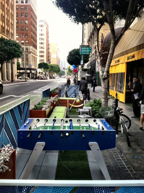 The "active" parklet contains a foosball table. The other contains a bar. (Sam Lubell / AN)