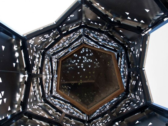 Looking up through Elevator B reveals its honeycomb shape. (Hive City Design Team)