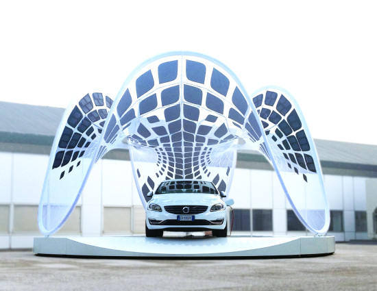 SYNTHESIS DESIGN + ARCHITECTURE'S PURE TENSION PAVILION DISPLAYS, SHADES, AND CHARGE'S THE NEW VOLVO V60 HYBRID CAR (SYNTHESIS DESIGN + ARCHITECTURE)