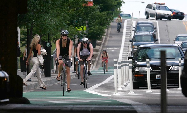 Chicago's first protected bike lane—photographed at Kinzie and Jefferson streets Monday, July 25, 2011—is cited as a model for Cincinnati's Central Parkway plan. (E. Jason Wambsgans/ Chicago Tribune)