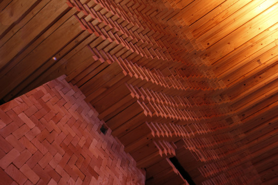 Both ceiling and walls carry the herringbone pattern. (Courtesy Taylor and Miller)