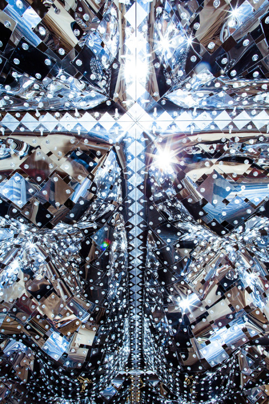 The installation's reflective canopy comprises thousands of pieces of silver-coated Mylar "quilted" together with acrylic fasteners. (Bryan Derballa)