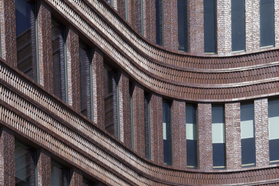 Mecanoo and Sasaki's Bruce C. Bolling Municipal Building features a curved brick and glass envelope. (Courtesy Mecanoo)