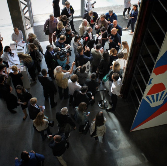 Rem Koolhaas leads reporters through the new Garage Museum of Contemporary Art. (Instagram: @garagemca)