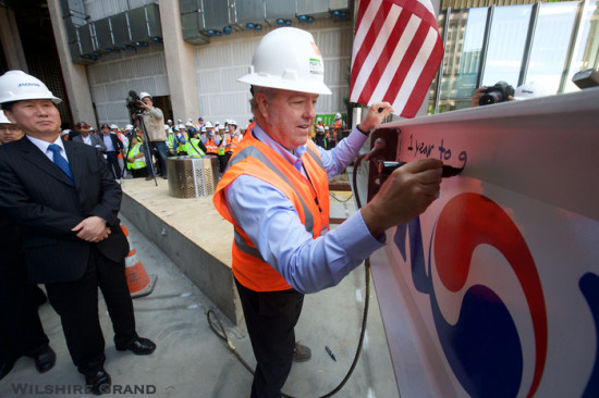 AC Martin CEO Christopher C. Martin, FAIA signing the Wilshire Grand Tower's final structural beam