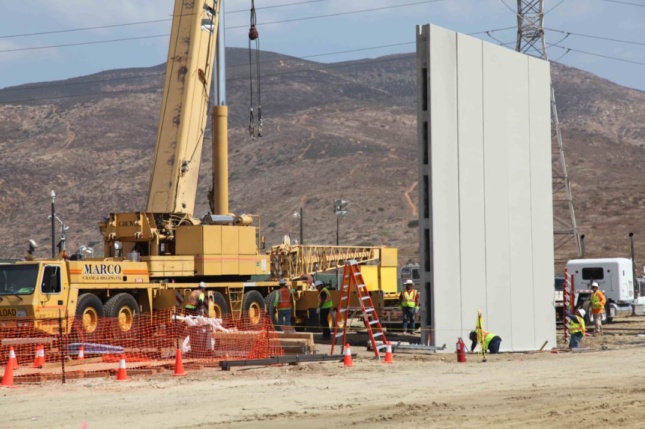 Erecting a border wall prototype near San Diego. (U.S. Customs and Border Protection/Twitter)
