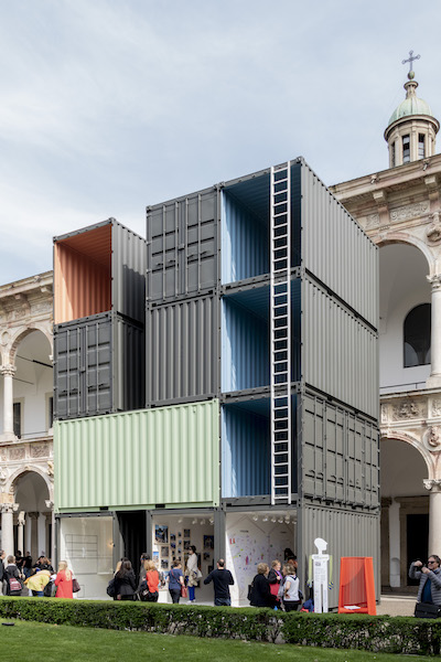 Piero Lissoni used shipping containers to create space for a Haitian photography exhibition that discussed the concept of home in poverty-stricken Haiti. 