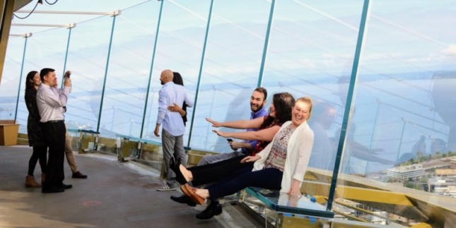 Photo of visitors to the exterior observation deck at the Seattle Space Needle