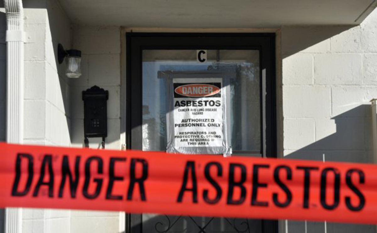 A photo of a foreclosed home containing asbestos