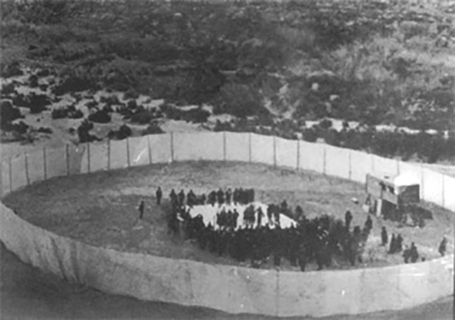 Photograph of the 1896 heavyweight prize fight in boxing, taken from the escarpment above the bed of the Rio Grande River where the fight was staged.