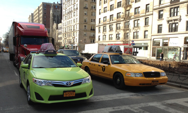Taxicabs of New York City. Medallion taxi (yellow) on the right. Boro taxi (apple green) on the left. (Z22, Via Wikimedia Commons)