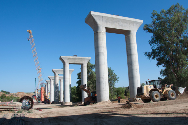 Construction is in full-swing on a pergola deck structure that will carry trains over the existing freight rail lines at the San Joaquin River Viaduct.