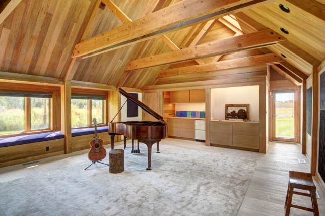 The music room with wood trusses above, refurbished by Martin Architects