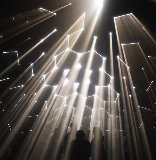 Labyrinths of light filter through the fabric skin of Atmosphere, an immersive installation examining the spatial qualities of light. As the sun’s angle changes throughout the day, so do the planes of light inside.