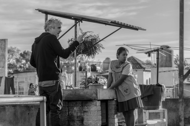 Director Alfonso Cuarón and actress Yalitza Aparicio on the set of Roma