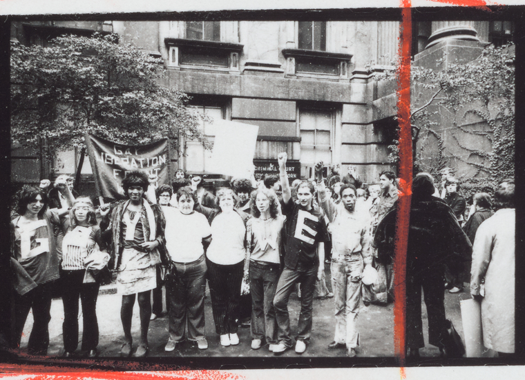 Members of the Gay Liberation Front with GAY POWER shirts at City Hall, New York in 1969-1972