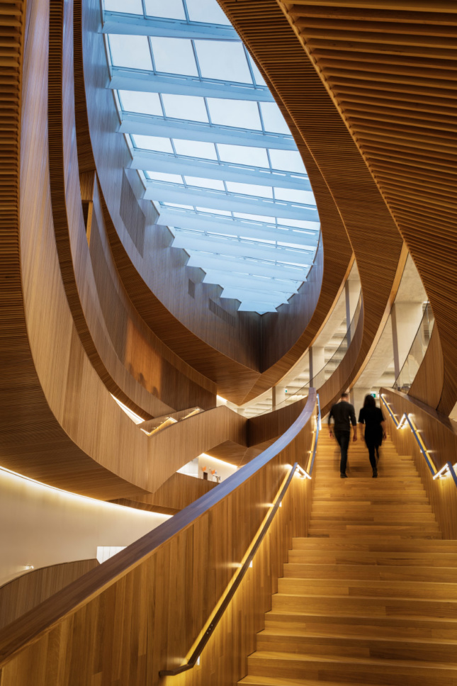 The edges of each floor have been carved out around an 85-foot-tall central atrium.