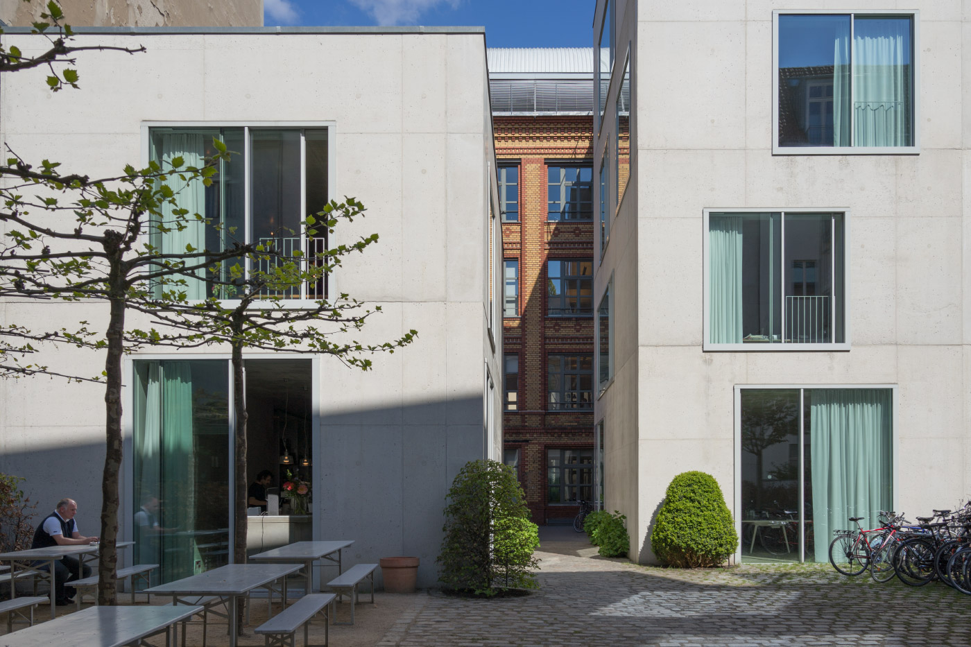 Chipperfield's Berlin office dialogues with the Chipperfield-designed Kantine in front of it.