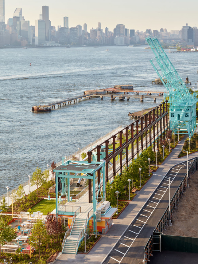 JCFO specified new and reclaimed materials that can withstand rain, sun, and everyday wear and tear, including custom concrete slabs and turquoise gantry cranes.