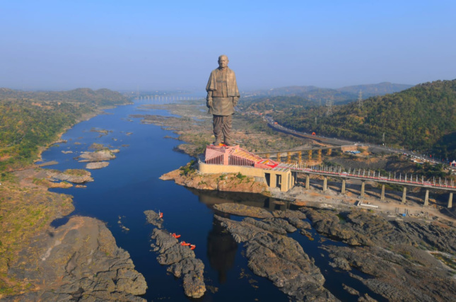 Photo of a massive statue in a river