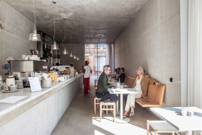 Inside the exposed concrete interior of Kantine, diners are treated to a reasonable, if linear, space.
