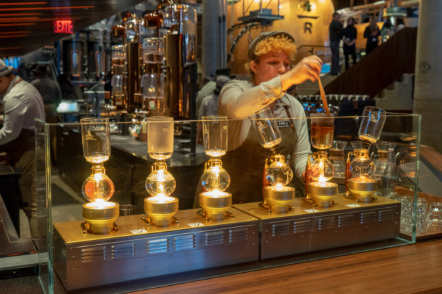 Starbucks Reserve Roastery New York coffee brewing process is put on display at each coffee bar.
