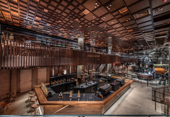 Starbucks Reserve Roastery New York View of the central coffee bar and upper mezzanine bar area.