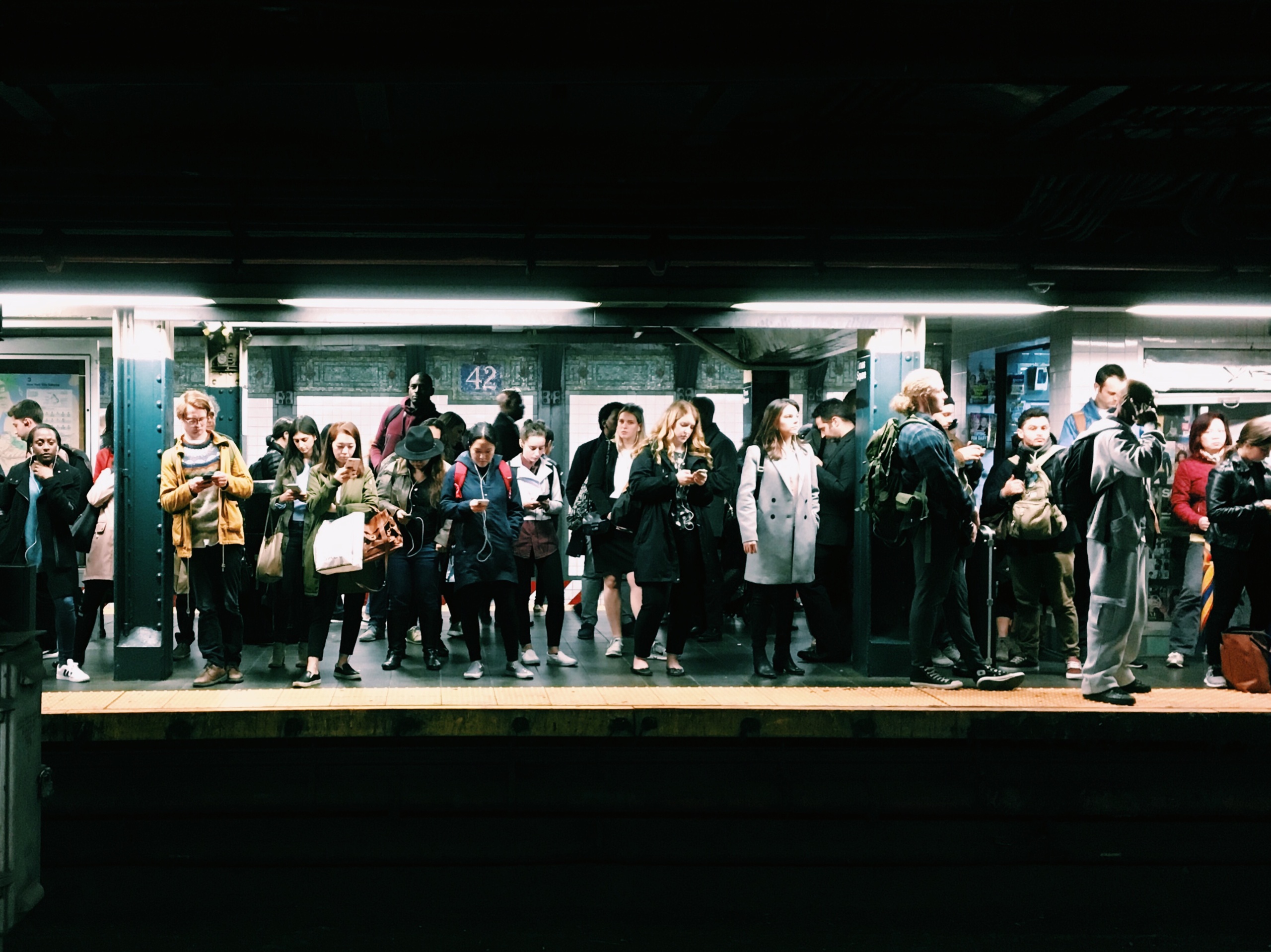 Photo of people waiting for the subway