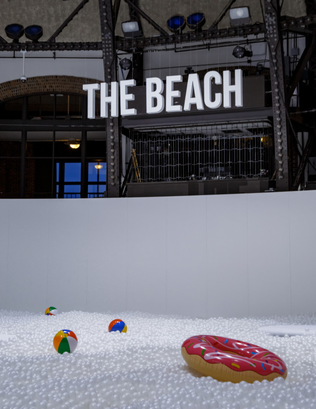 Photo of a Beach sign and ball pit