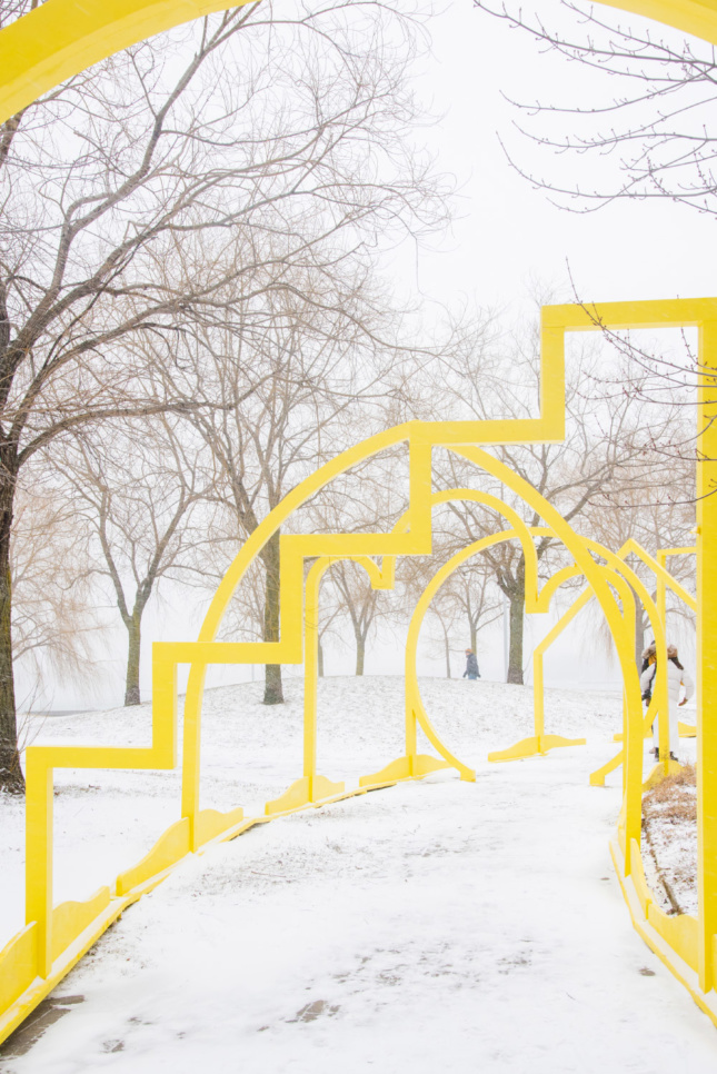 Photo of yellow gates in the snow