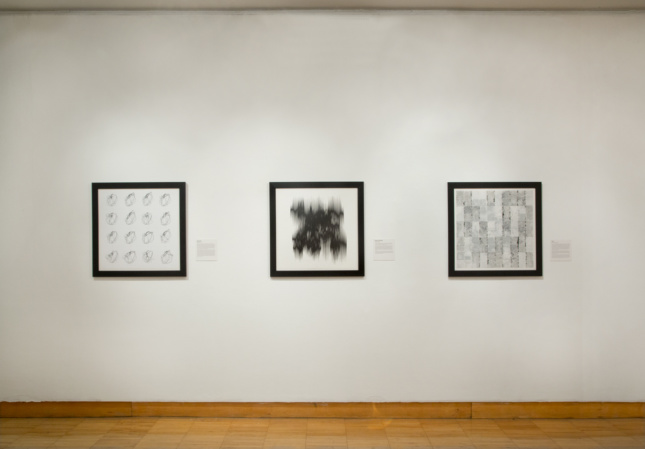 Photo of Drawing Codes exhibition showing drawings on the wall