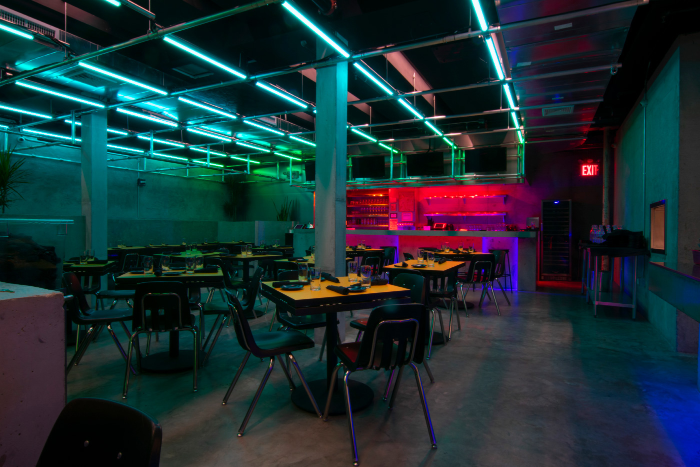 Photo of a neon-lit restaurant interior