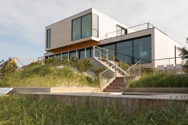 A beach house elevated on dunes