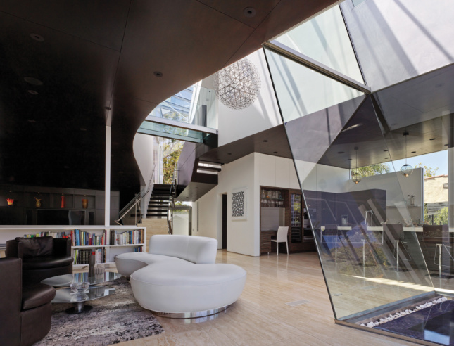 A living room with a sculptural skylight