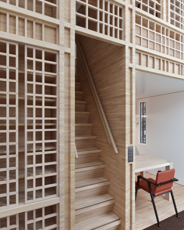 An office with prevalent timber screens