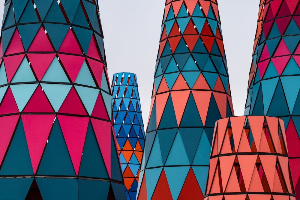 Photo of brightly colored conical towers
