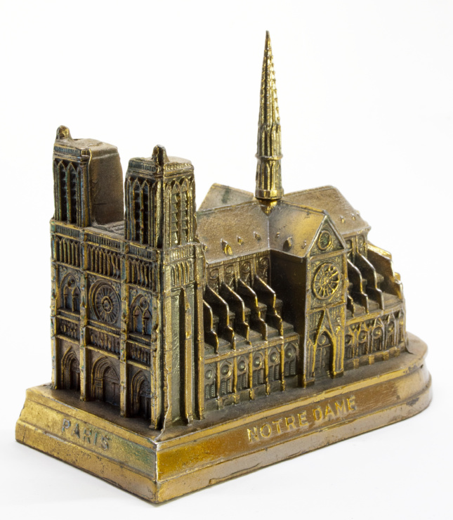Photo of a metal model of Paris's Notre Dame Cathedral