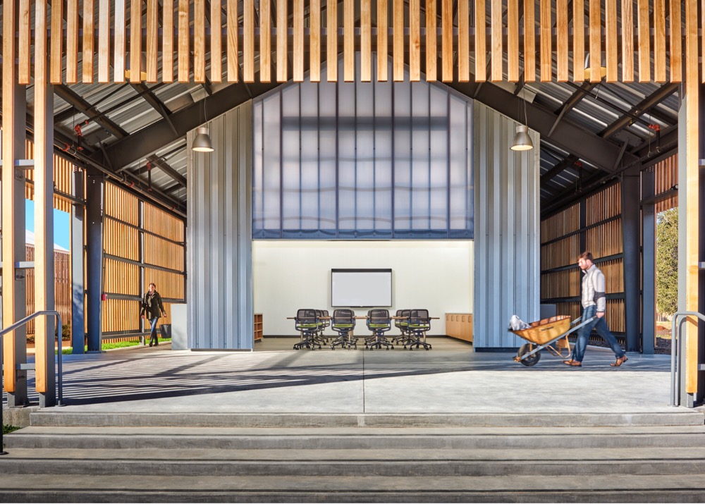 Photo of a barn-like building with an office space inside