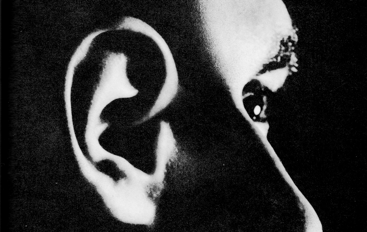 Black and white photo collage of an ear, nose, and eye