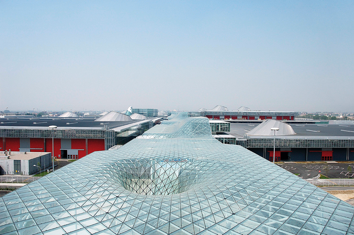 Image of undulating glass roof of convention center