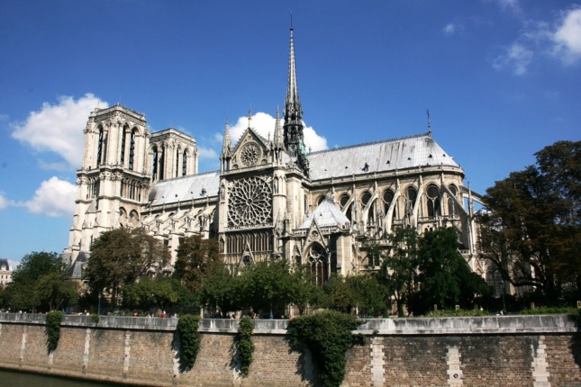 Photo of Notre Dame during the day, side angle
