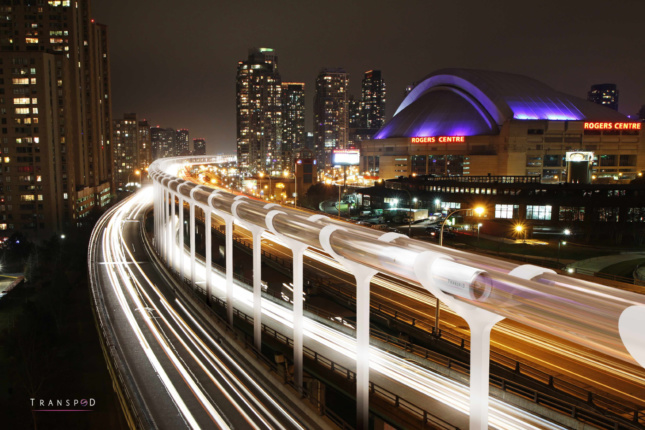 Rendering of Toronto at night with a hyperloop track