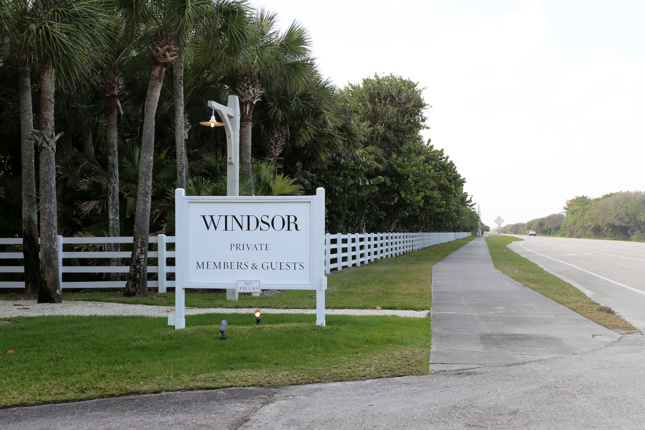 Photo of the street sign for Windsor, Florida that says "WINDSOR PRIVATE MEMBERS & GUESTS"