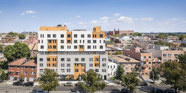 Photo of mid-rise affordable housing building in Queens