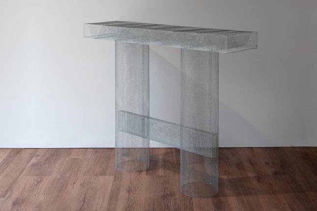 Photo of console table made of metal mesh