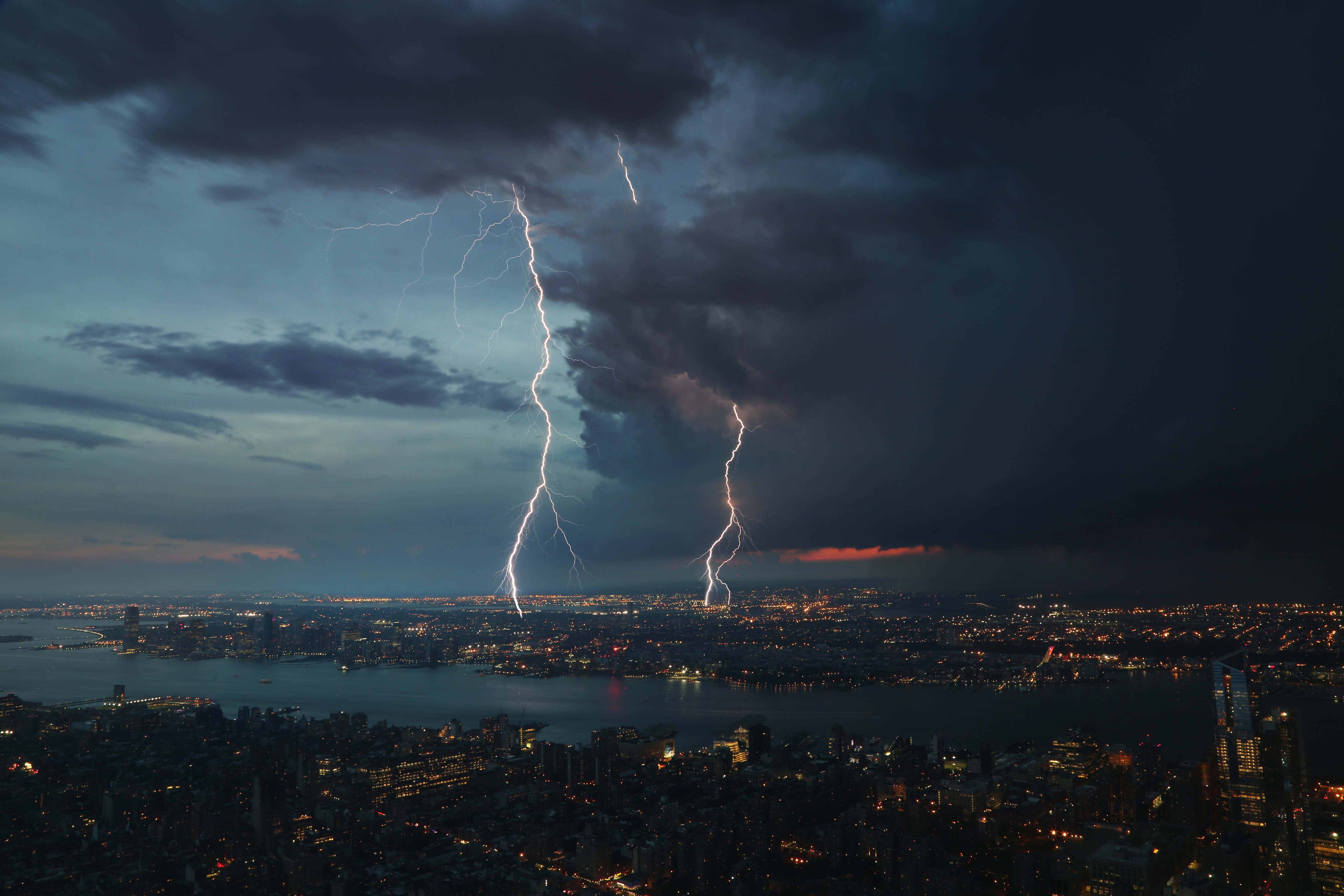 Aerial photo of lightning striking a city