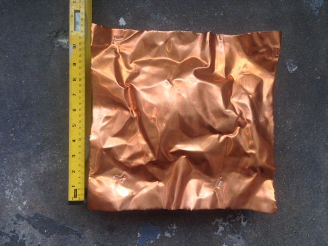 Photo of crinkled copper sheet